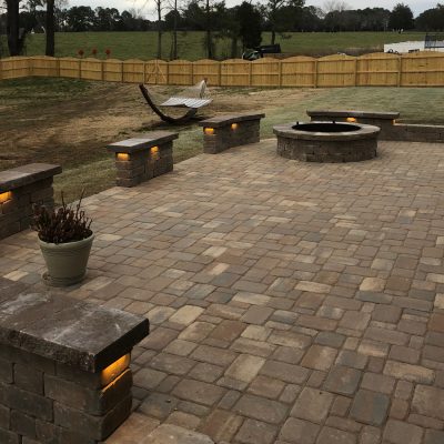 Added outdoor lighting features enhance your custom hardscape.